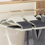 50-Piece Clothes Hanger Set with Eight Clasps, Padded Shoulder Strips and Swivel Hooks in Orange or Grey