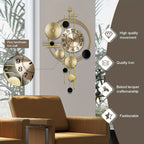 Golden Metal Art Wall Clock with Asymmetrical Circular Accents, Analog Dial and 30.7 x 17.7-Inch Size